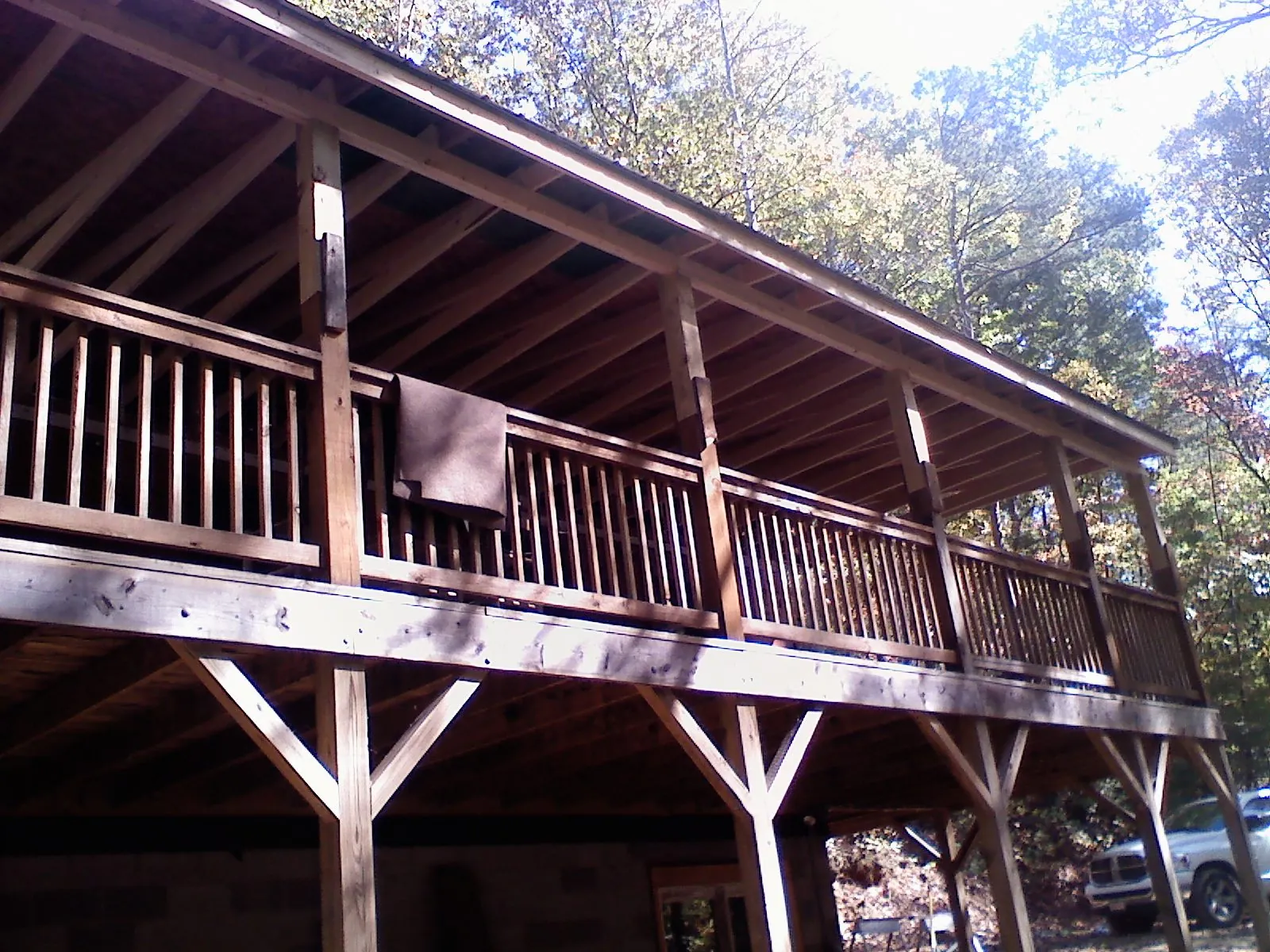 Timber framing under a new elevated porch and deck — Roof Leak Repair in Thompson Falls by Roofing Brothers